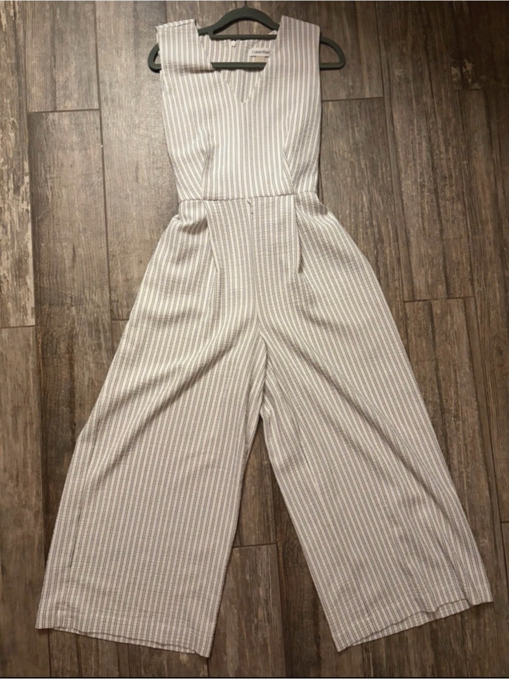 Calvin Klein Sleeveless Striped Wide-Leg Jumpsuit in black and White